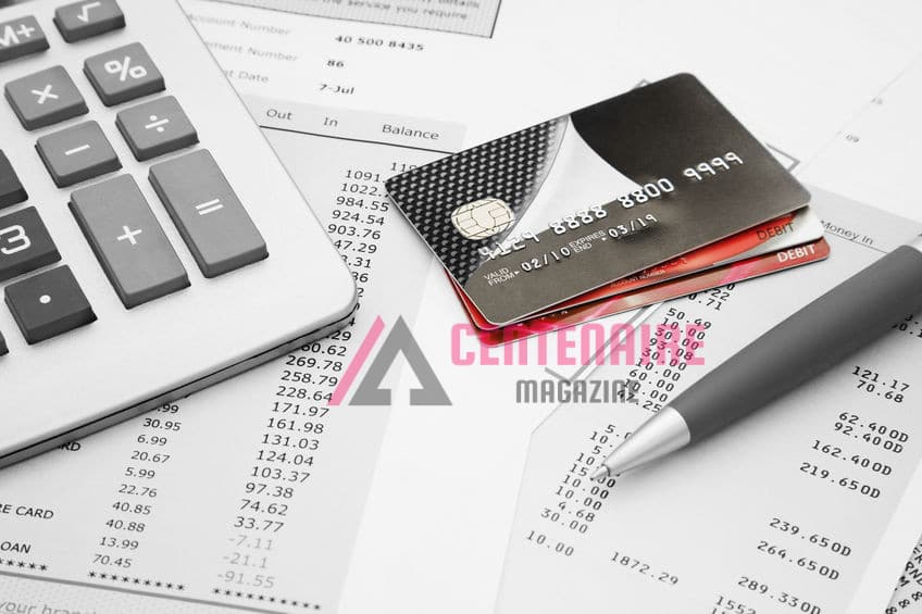Close up of a credit cards with credit card statements,pen and calculator